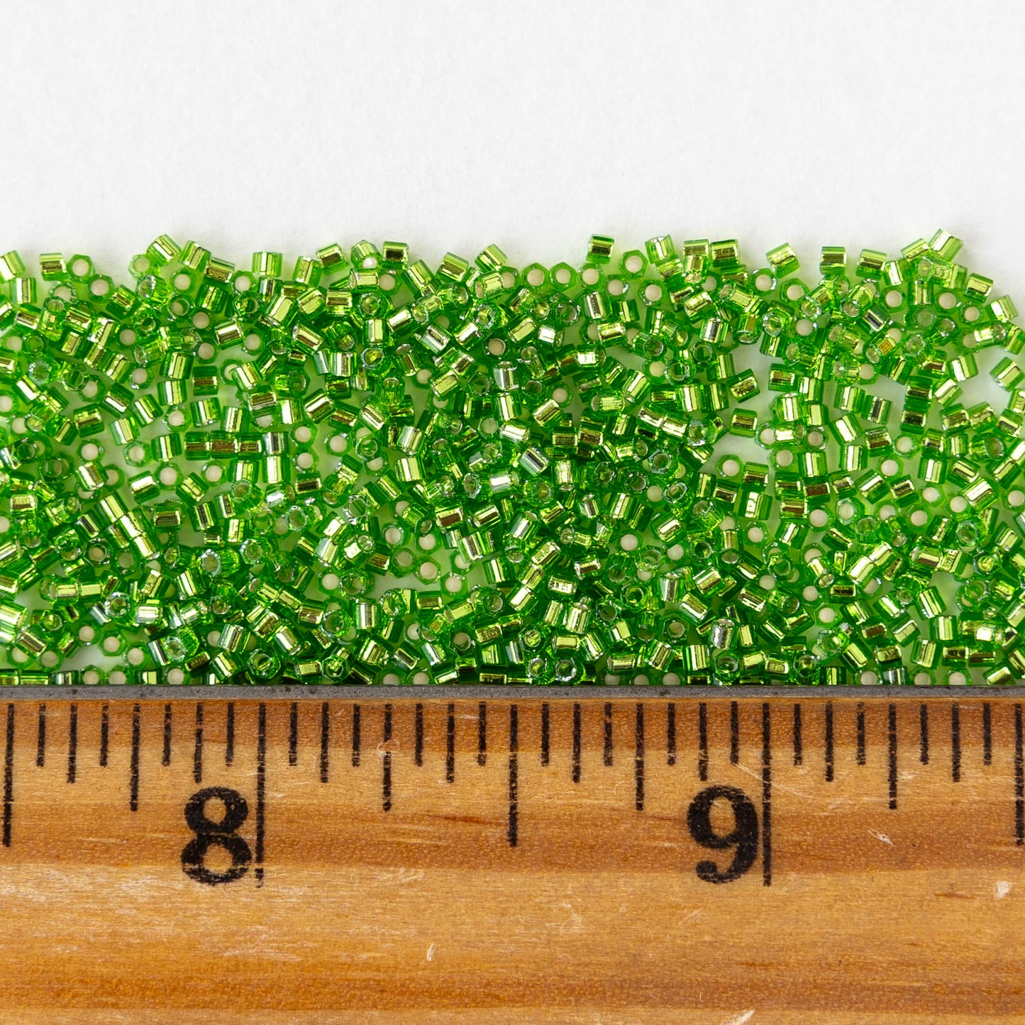 15/0 Glass Hex Cut Seed Beads - Silver Lined Peridot - 10 grams