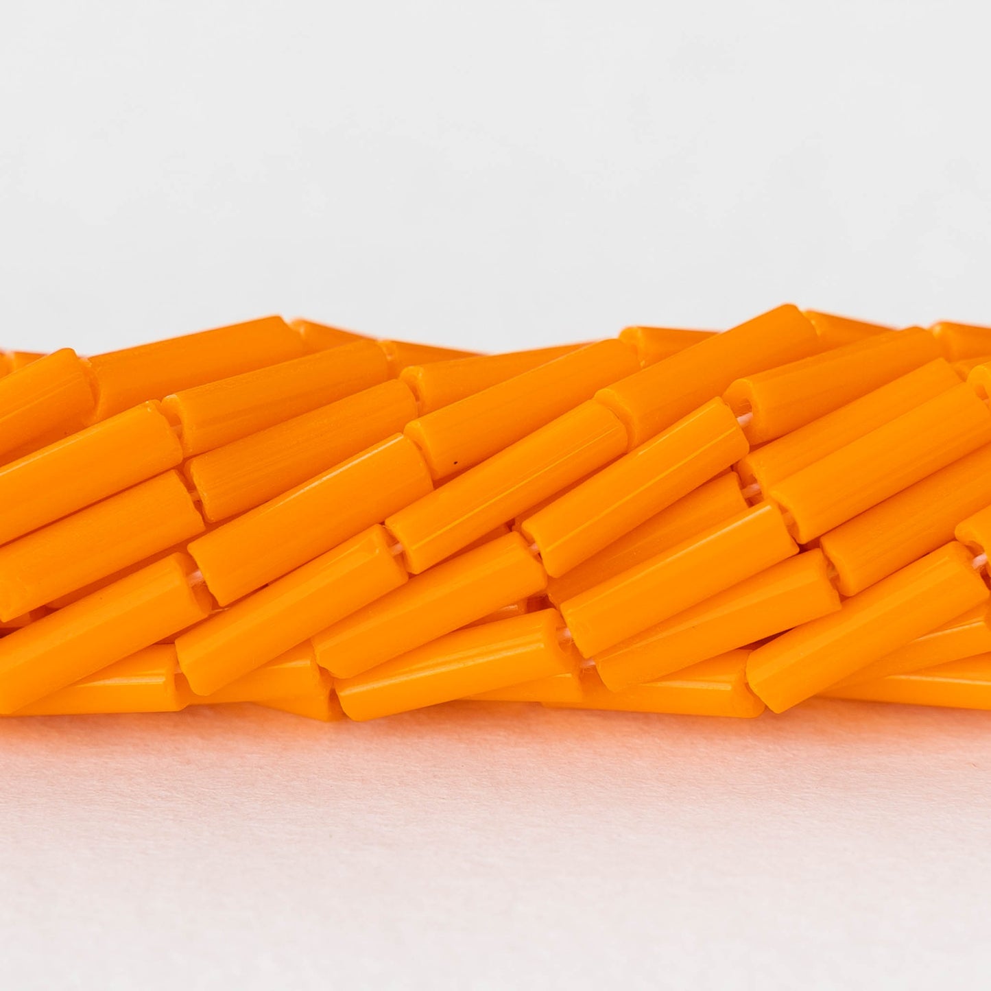 Size 4 Bugle Beads - Opaque Yellow Orange - 4 strands ~240 beads