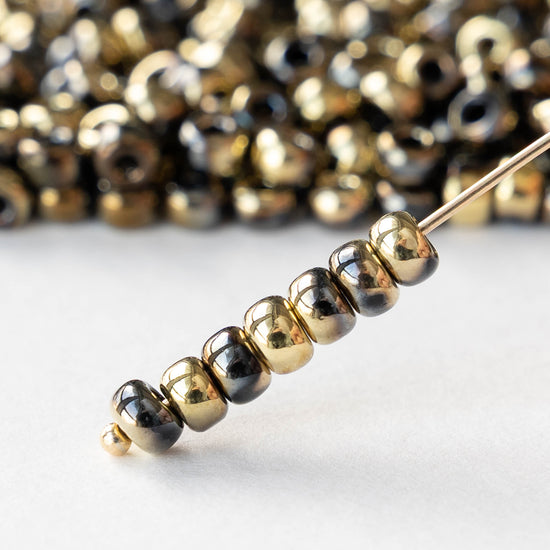 Size 6/0 Glass Seed Beads - Opaque Black and Gold - 10 grams