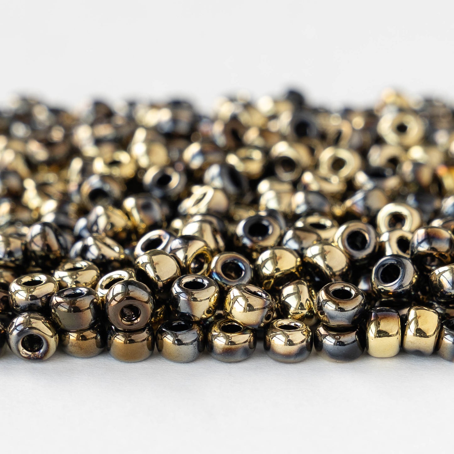 Size 6/0 Glass Seed Beads - Opaque Black and Gold - 10 grams
