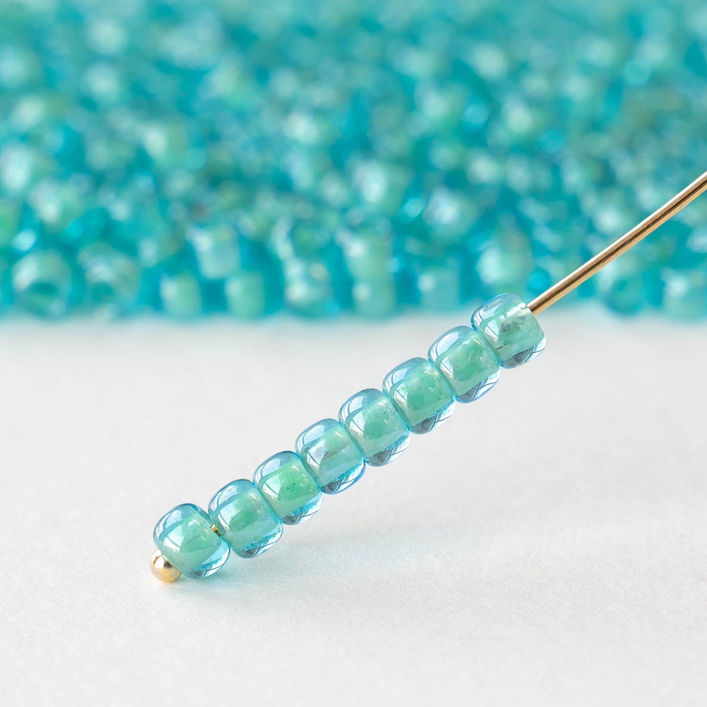Size 6/0 Glass Seed Beads - Jonquil Lined Seafoam - 10 grams ~180 beads