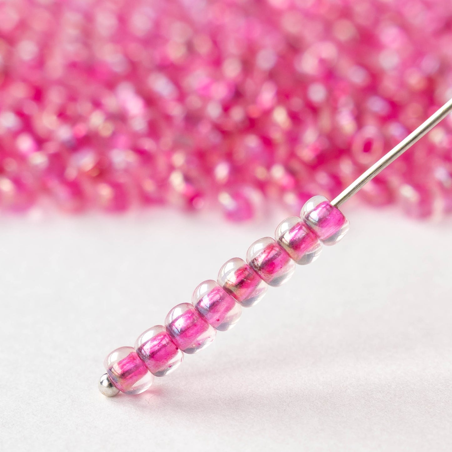 Size 6/0 Glass Seed Beads - Hot Pink Lined Crystal Luster - 20 grams