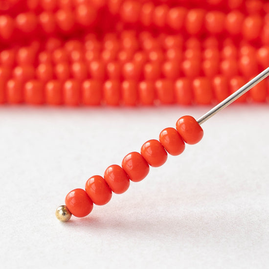 6/0 Glass Seed Beads - Opaque Dark Orange - 20 inch strands - 2 or 6 strands