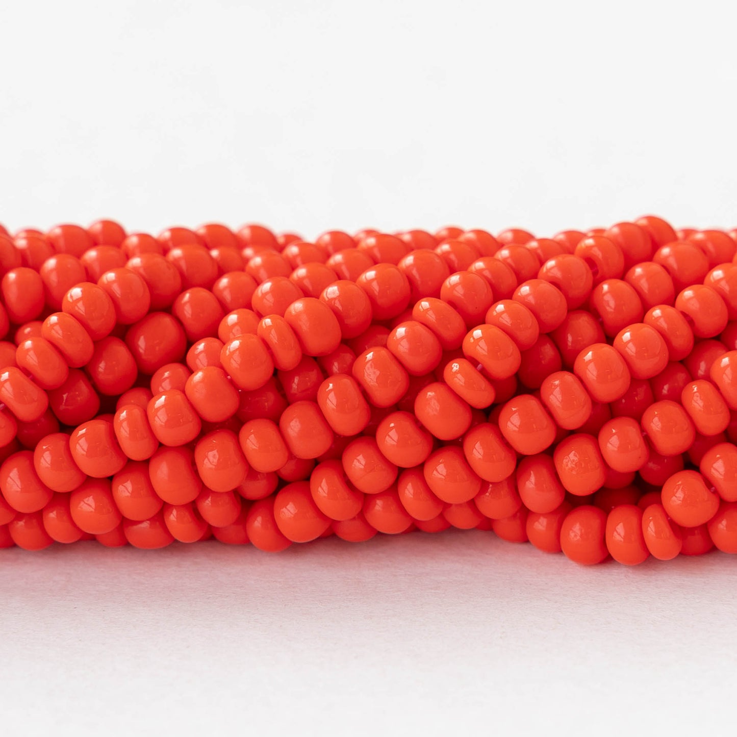 6/0 Glass Seed Beads - Opaque Dark Orange - 20 inch strands - 2 or 6 strands