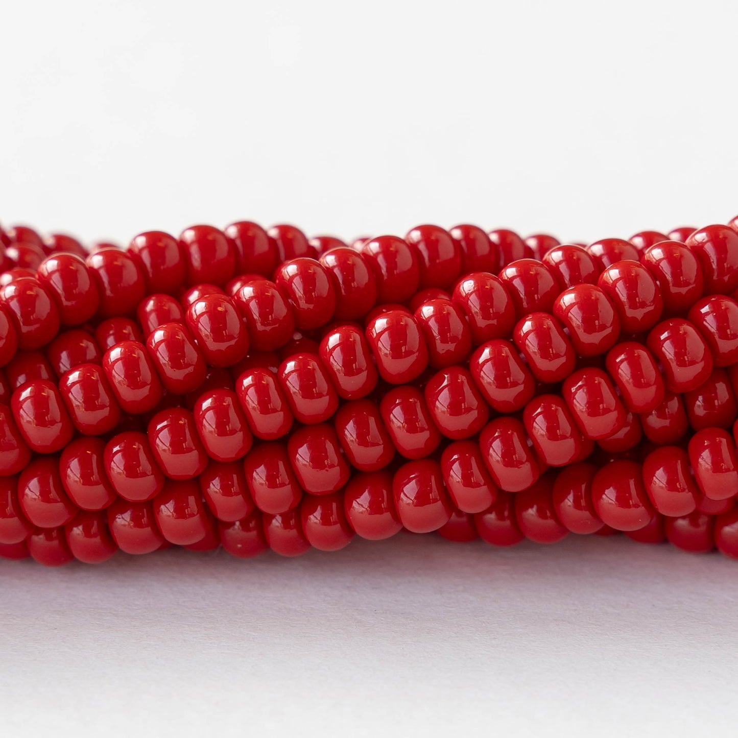 6/0 Glass Seed Beads - Opaque Dark Red - 20 inch strands - 2 or 6 strands