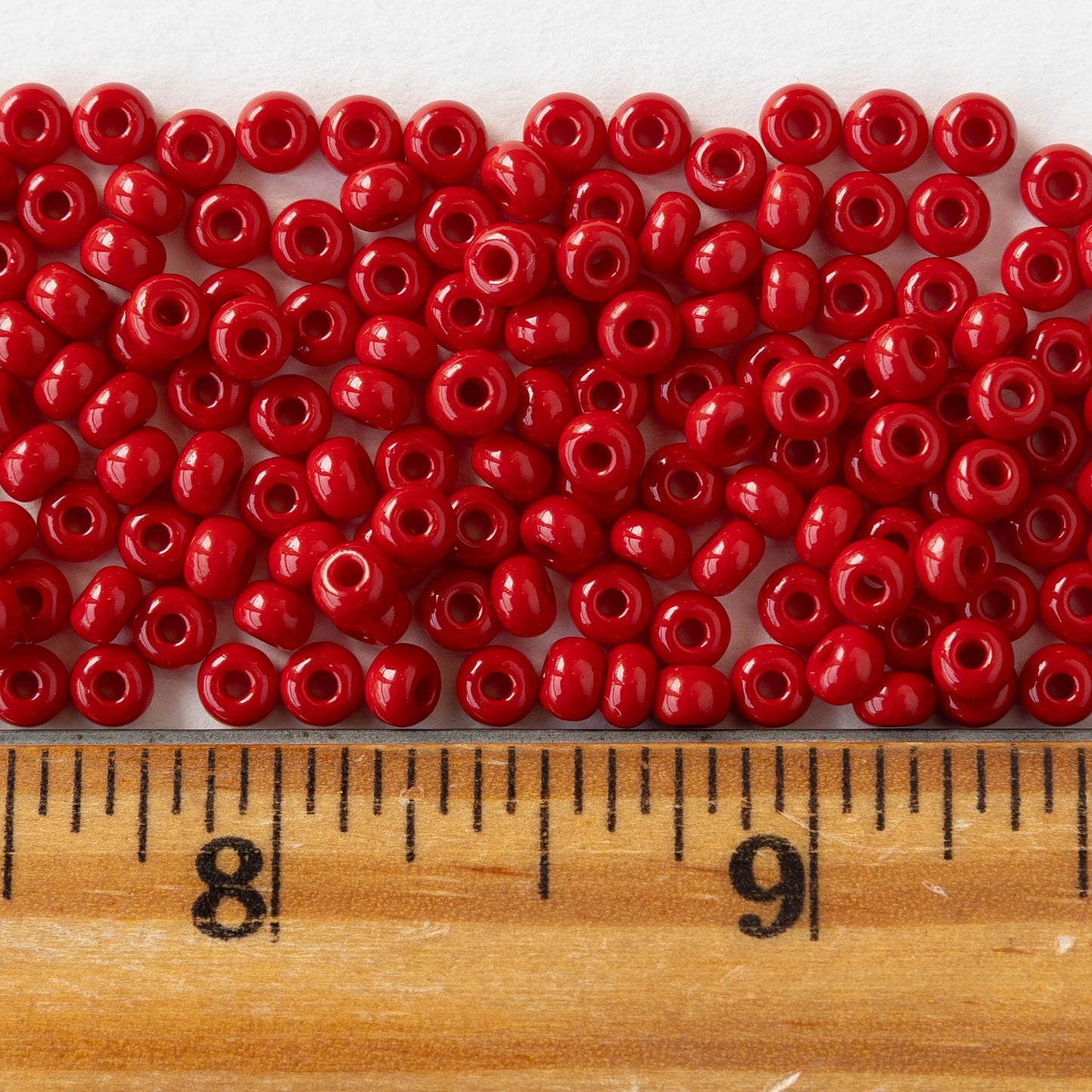 6/0 Glass Seed Beads - Opaque Dark Red - 20 inch strands - 2 or 6 strands