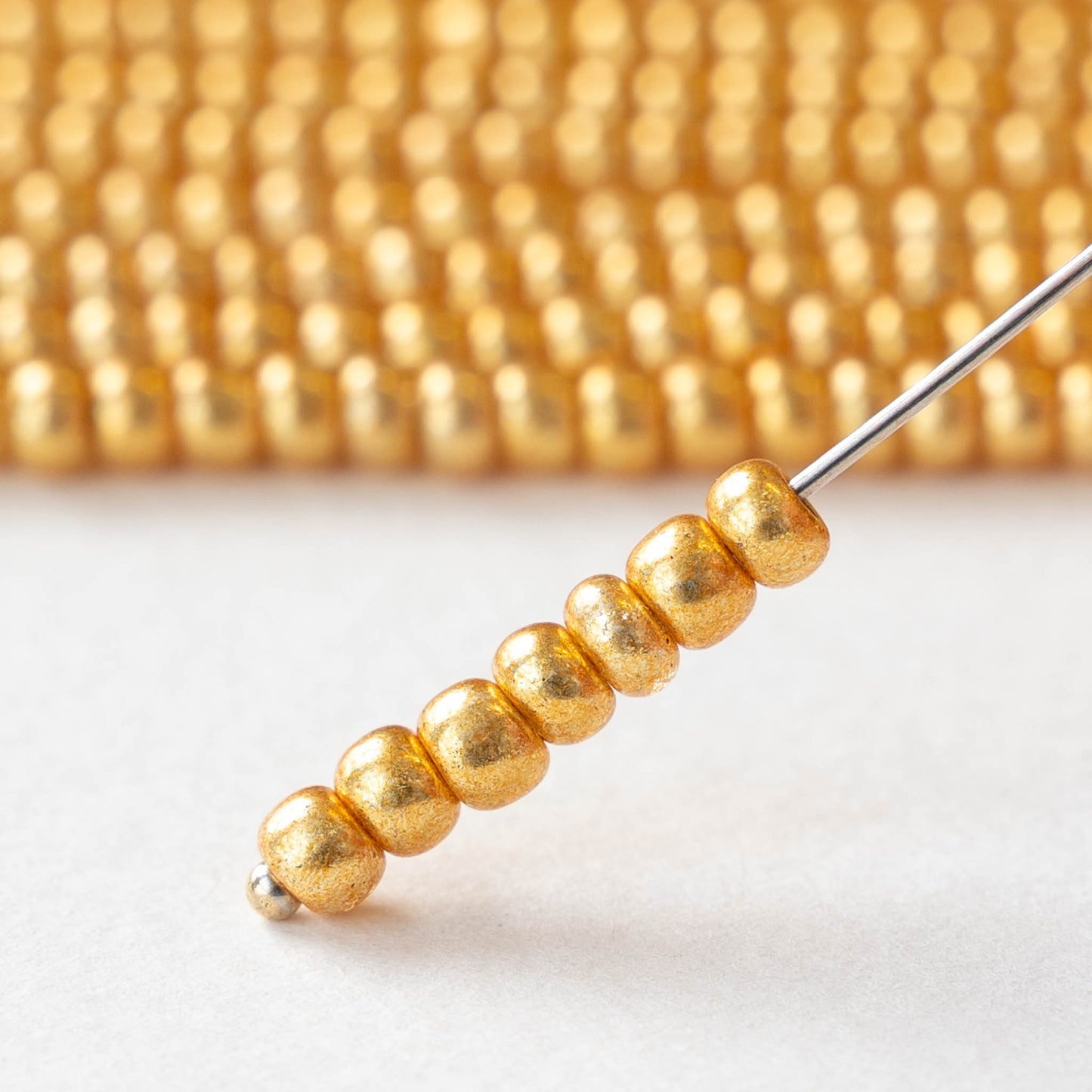 6/0 Glass Seed Beads - Opaque Gold Metallic - 20 inch strands - 1 or 3 strands