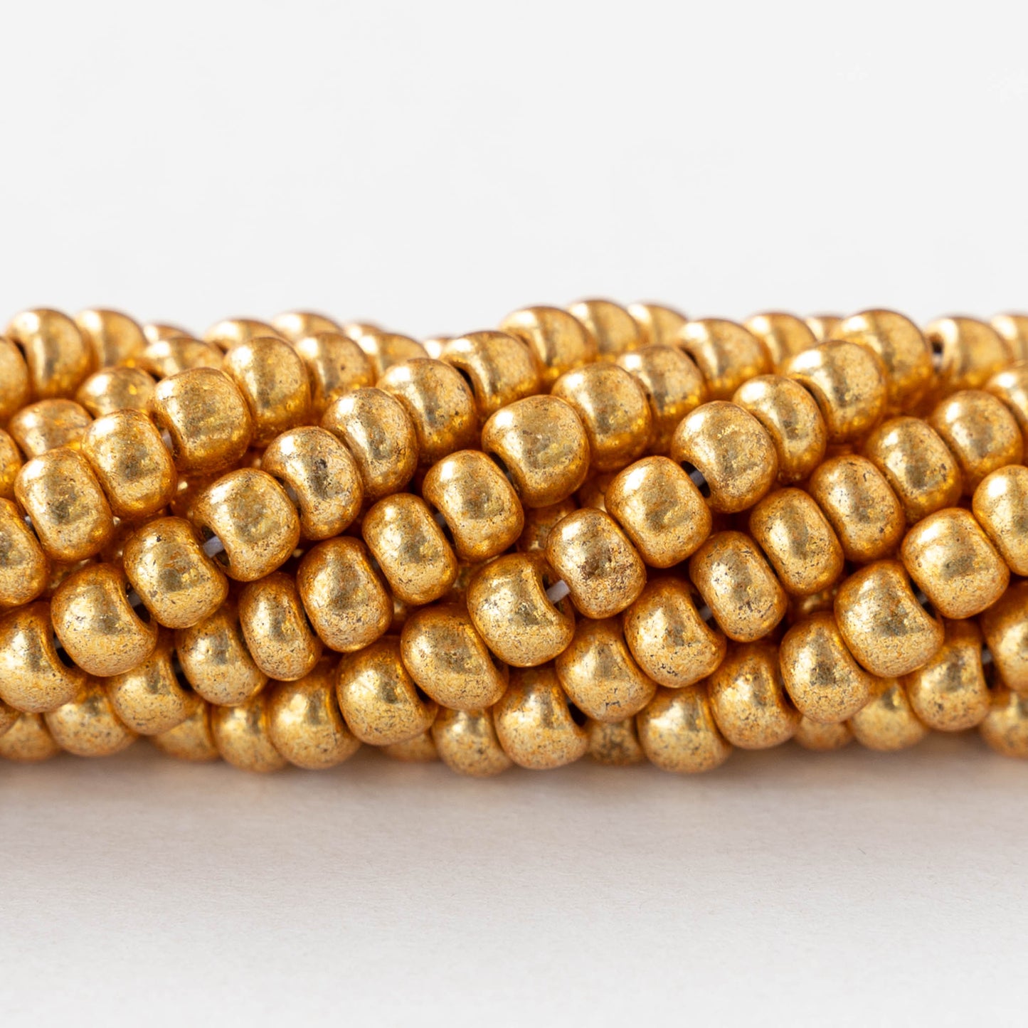 6/0 Glass Seed Beads - Opaque Gold Metallic - 20 inch strands - 1 or 3 strands