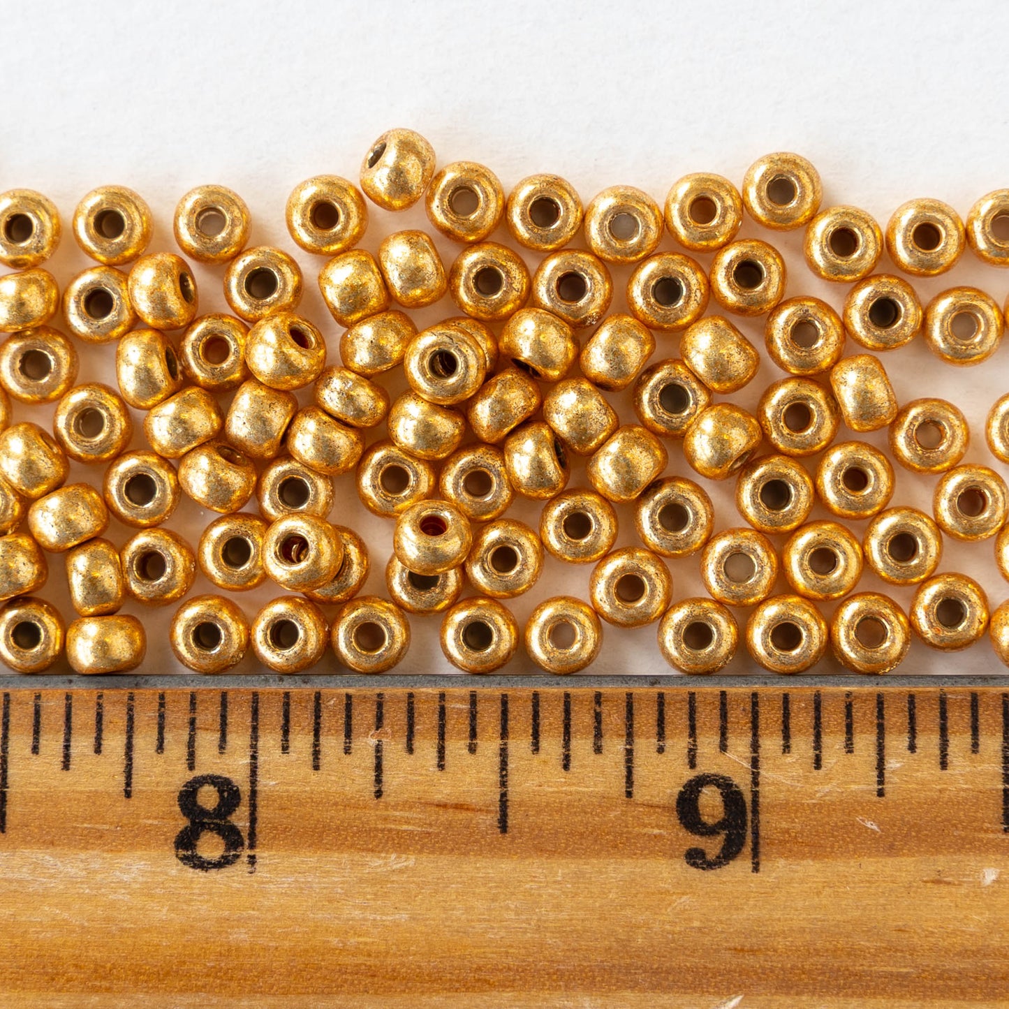 6/0 Glass Seed Beads - Opaque Gold Metallic - 20 inch strands - 1 or 3 strands