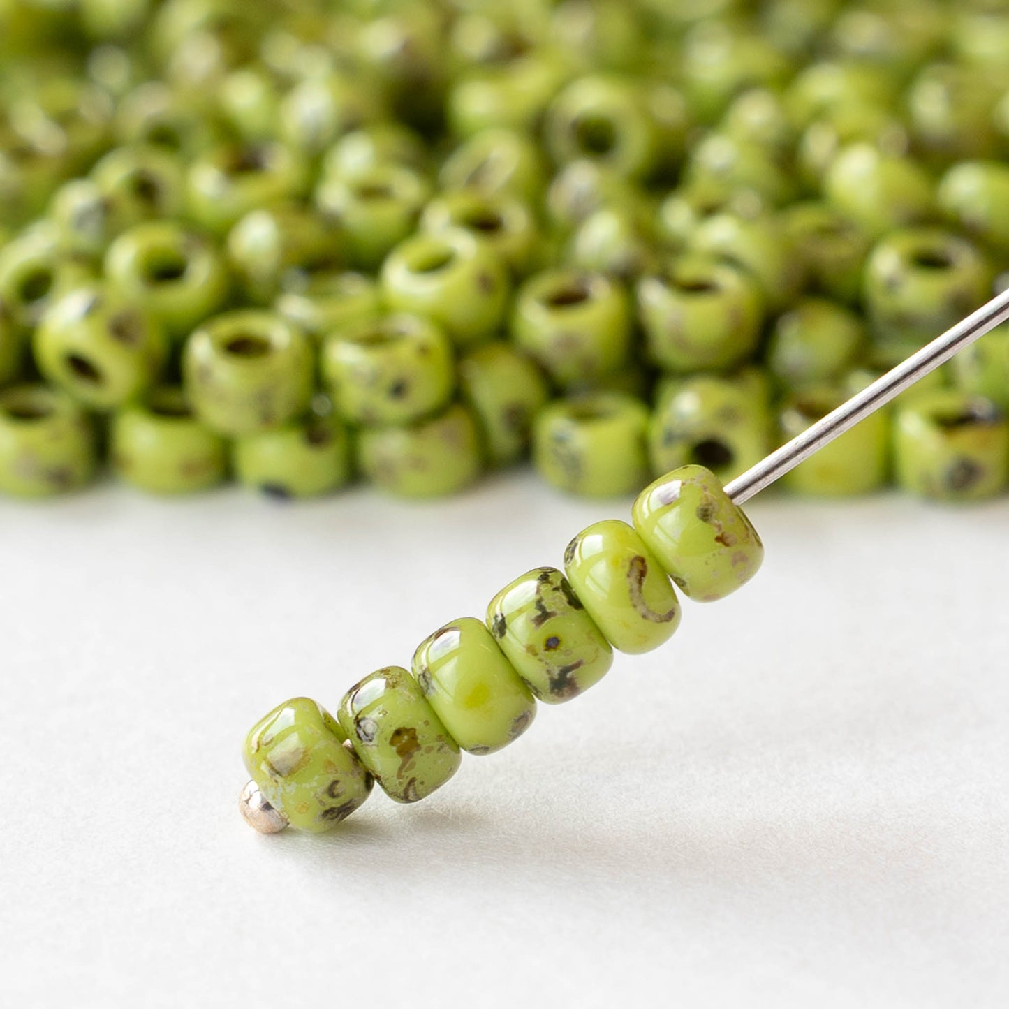 Size 6/0 Glass Seed Beads - Opaque Green Picasso - 10 grams ~135 beads