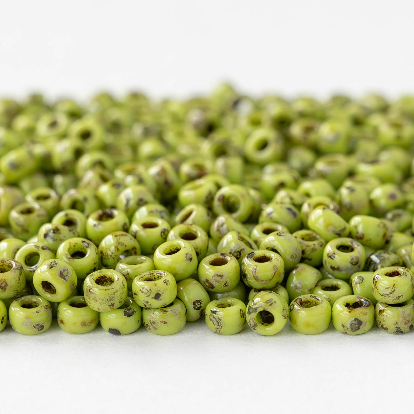 Size 6/0 Glass Seed Beads - Opaque Green Picasso - 10 grams ~135 beads