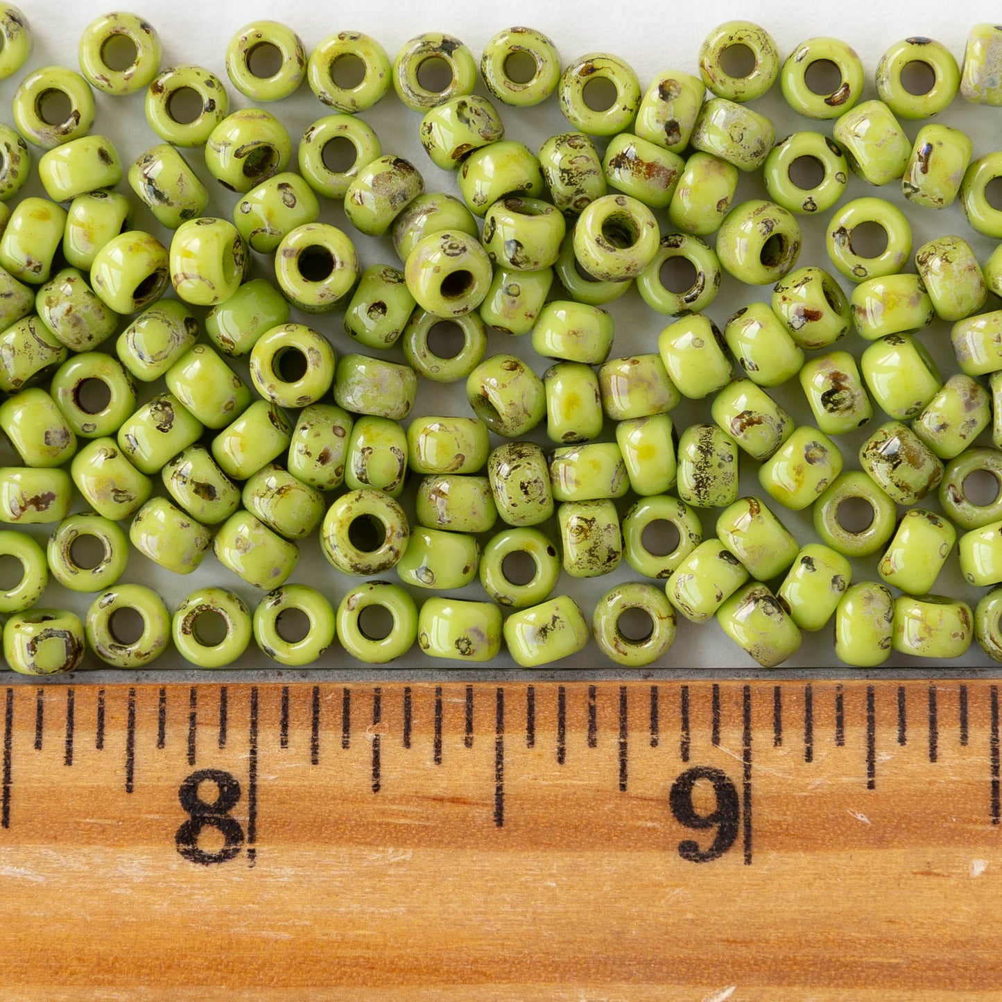 Size 6/0 Glass Seed Beads - Opaque Green Picasso - 10 grams ~135 beads