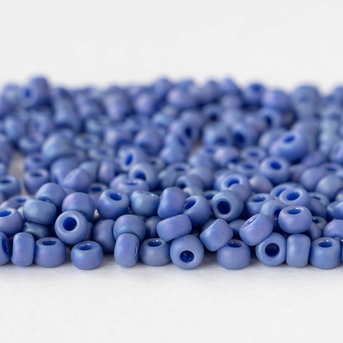 Size 6/0 Glass Seed Beads - Opaque Periwinkle AB - 10 grams