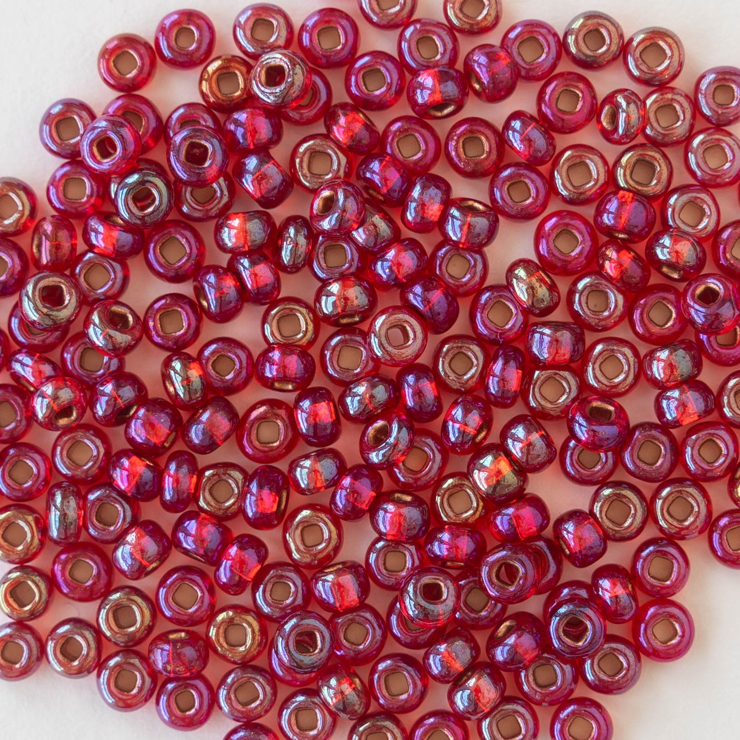 Load image into Gallery viewer, 6/0 Seed Beads - Copper Lined Red AB - 2 Strands
