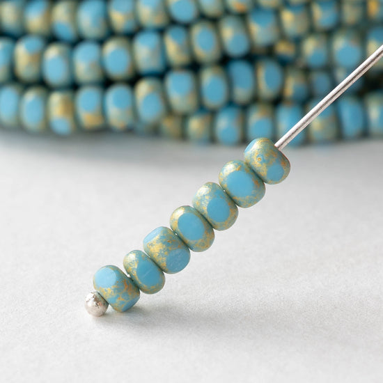 6/0 Tri-cut Seed Beads -  Opaque Blue Turquoise with Gold Dust - 50 Beads