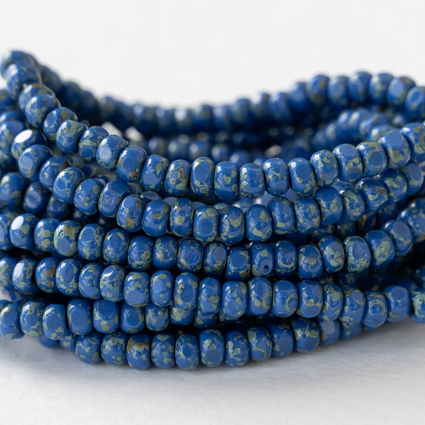 6/0 Tri-cut Seed Beads -  Opaque Blue Lapis with Picasso - 50 Beads