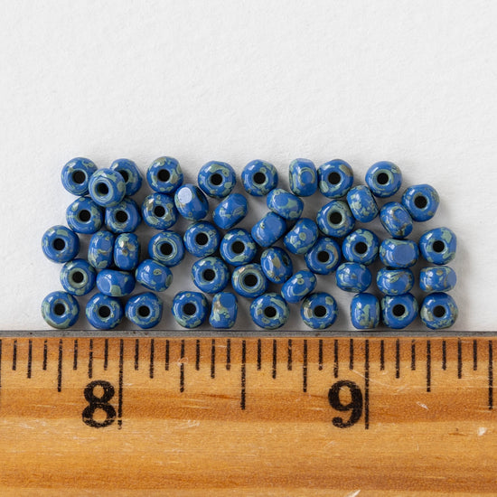 6/0 Tri-cut Seed Beads -  Opaque Blue Lapis with Picasso - 50 Beads