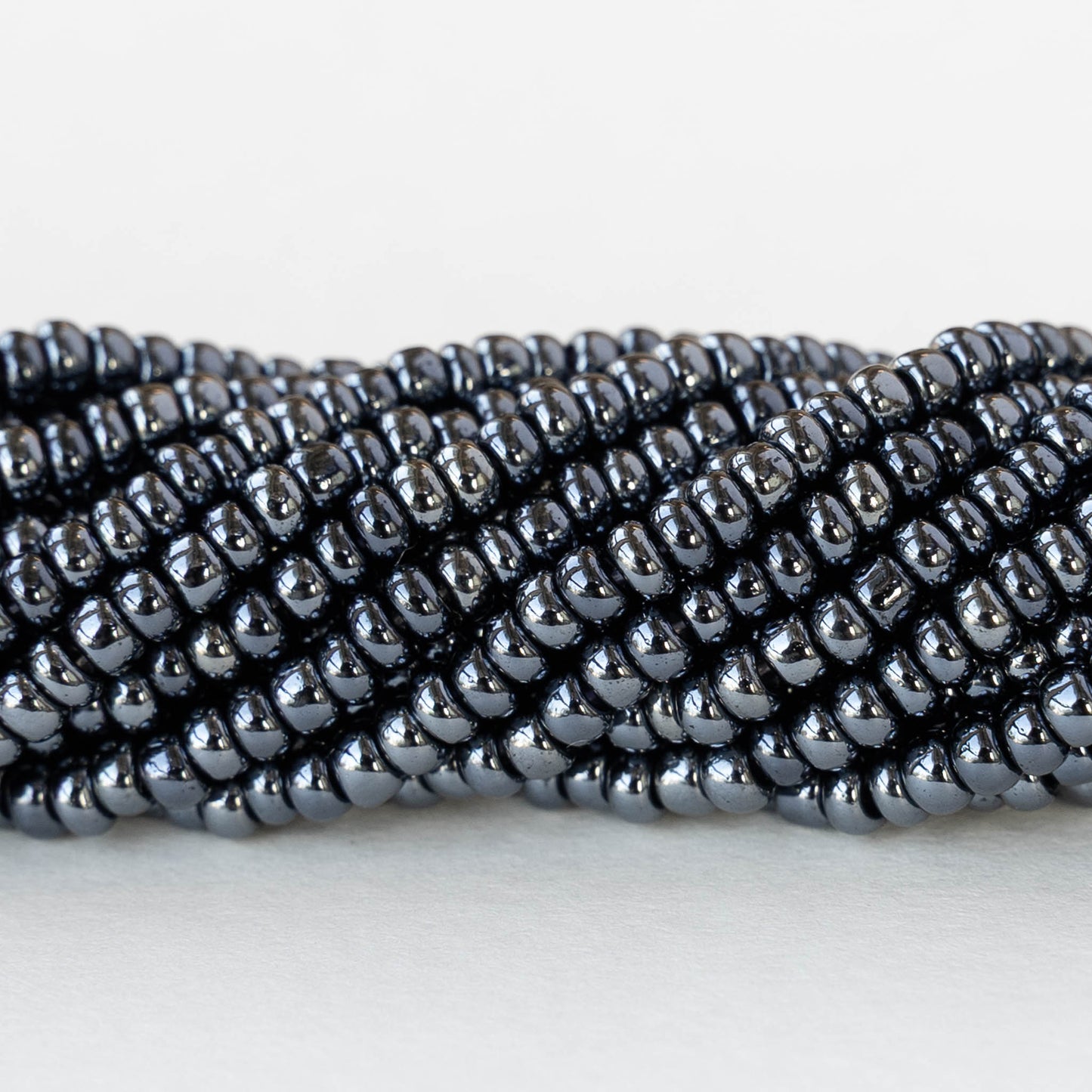 Size 8/0 Glass Seed Beads - Sphinx Hematite - 3 18-inch strands