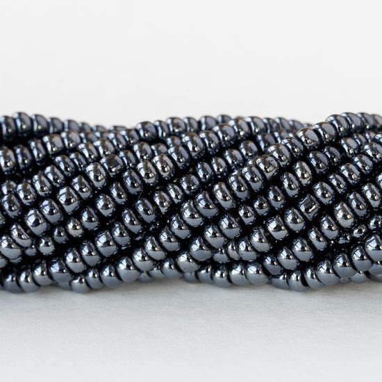 Size 8/0 Glass Seed Beads - Sphinx Hematite - 3 18-inch strands