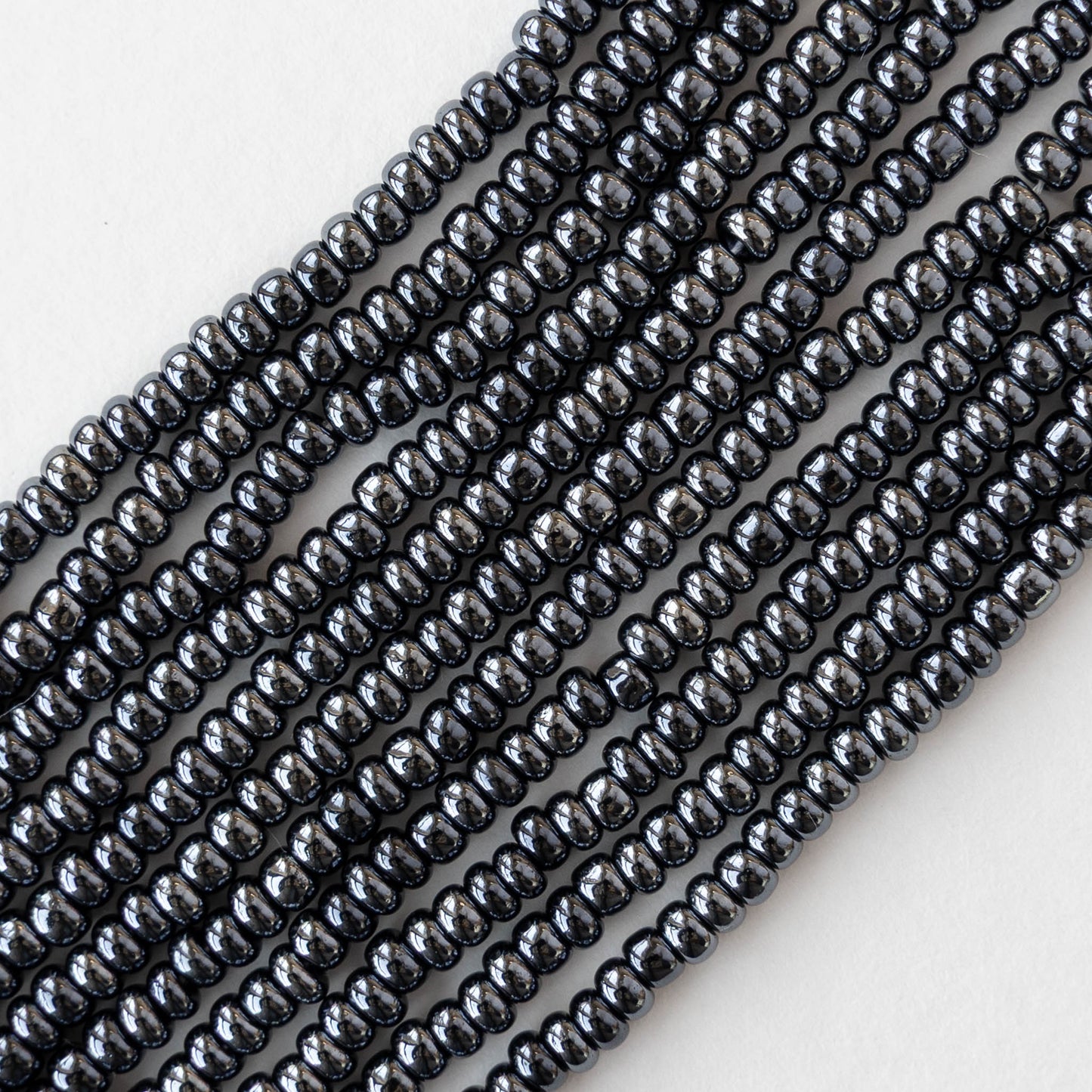 Size 8/0 Glass Seed Beads - Sphinx Hematite - 3 18-inch strands