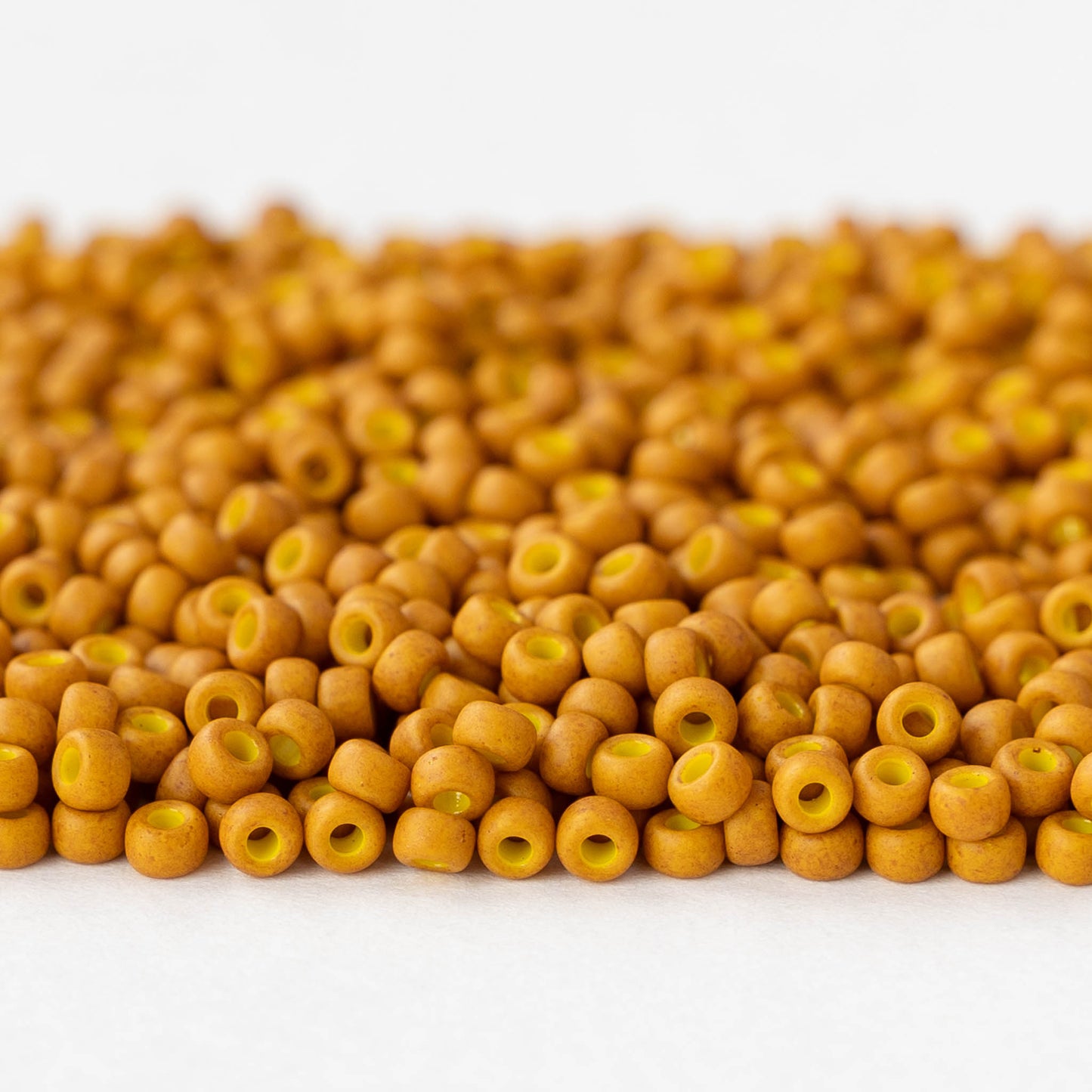 Size 8/0 Glass Seed Beads - Matte Opaque Mustard - 10 grams
