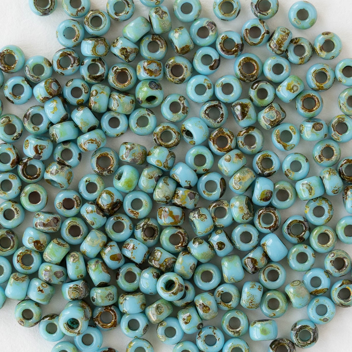 Size 8/0 Glass Seed Beads - Opaque Turquoise Picasso - 10 grams