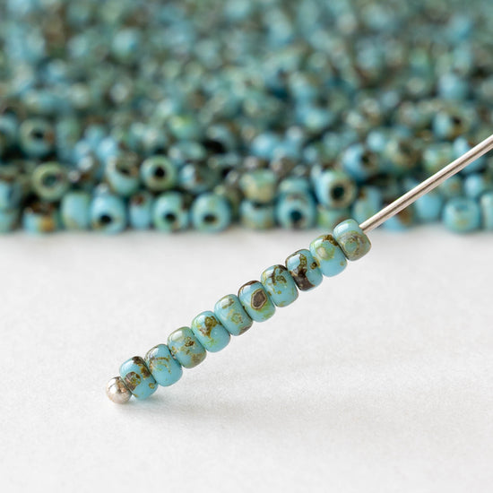 Size 8/0 Glass Seed Beads - Opaque Turquoise Picasso - 10 grams