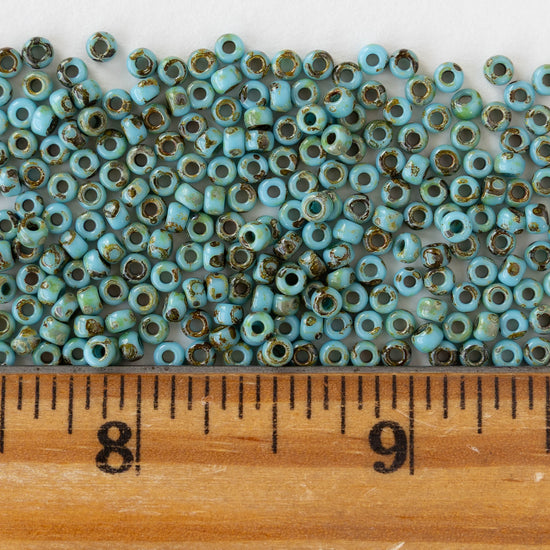 Size 8/0 Glass Seed Beads - Opaque Turquoise Picasso - 10 grams