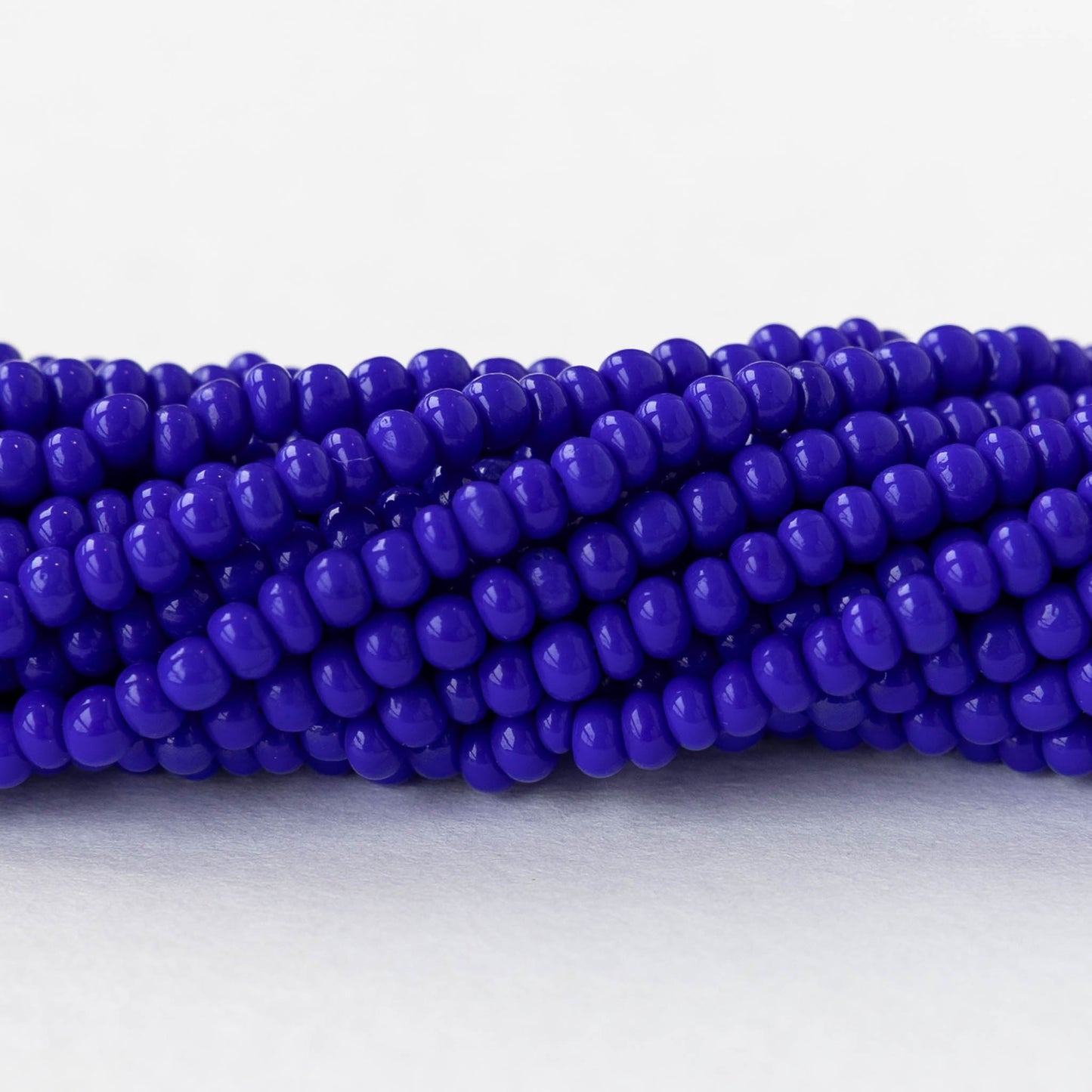 9/0 Glass Seed Beads - Opaque Cobalt Blue - 18 inch strands - Whole or Half hank