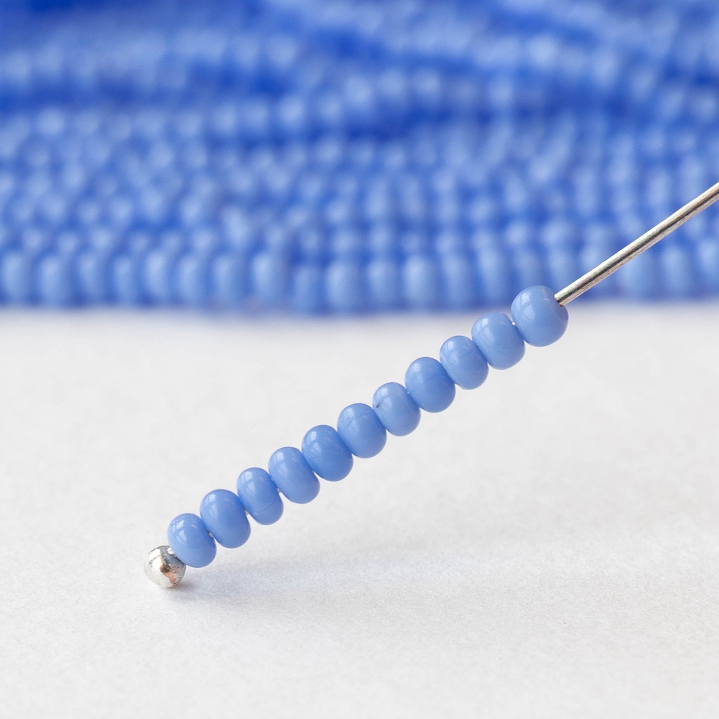 9/0 Glass Seed Beads - Opaque Light Blue - 18 inch strands - Whole or Half hank