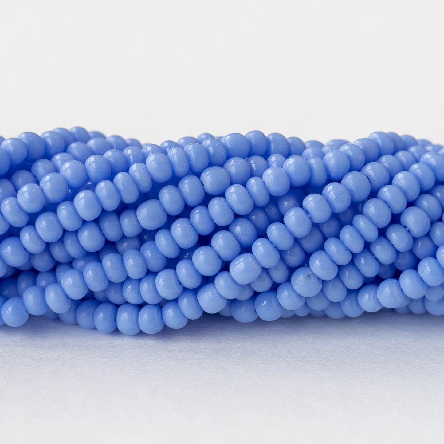 9/0 Glass Seed Beads - Opaque Light Blue - 18 inch strands - Whole or Half hank