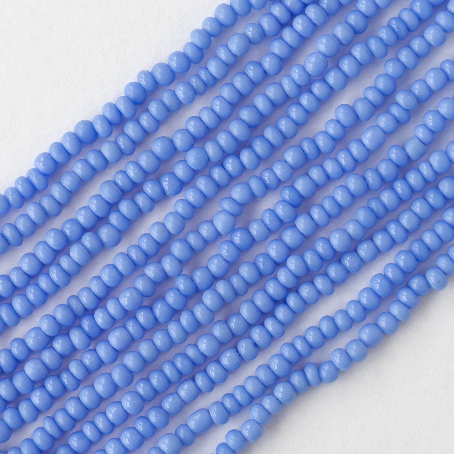 9/0 Glass Seed Beads - Opaque Light Blue - 18 inch strands - Whole or Half hank