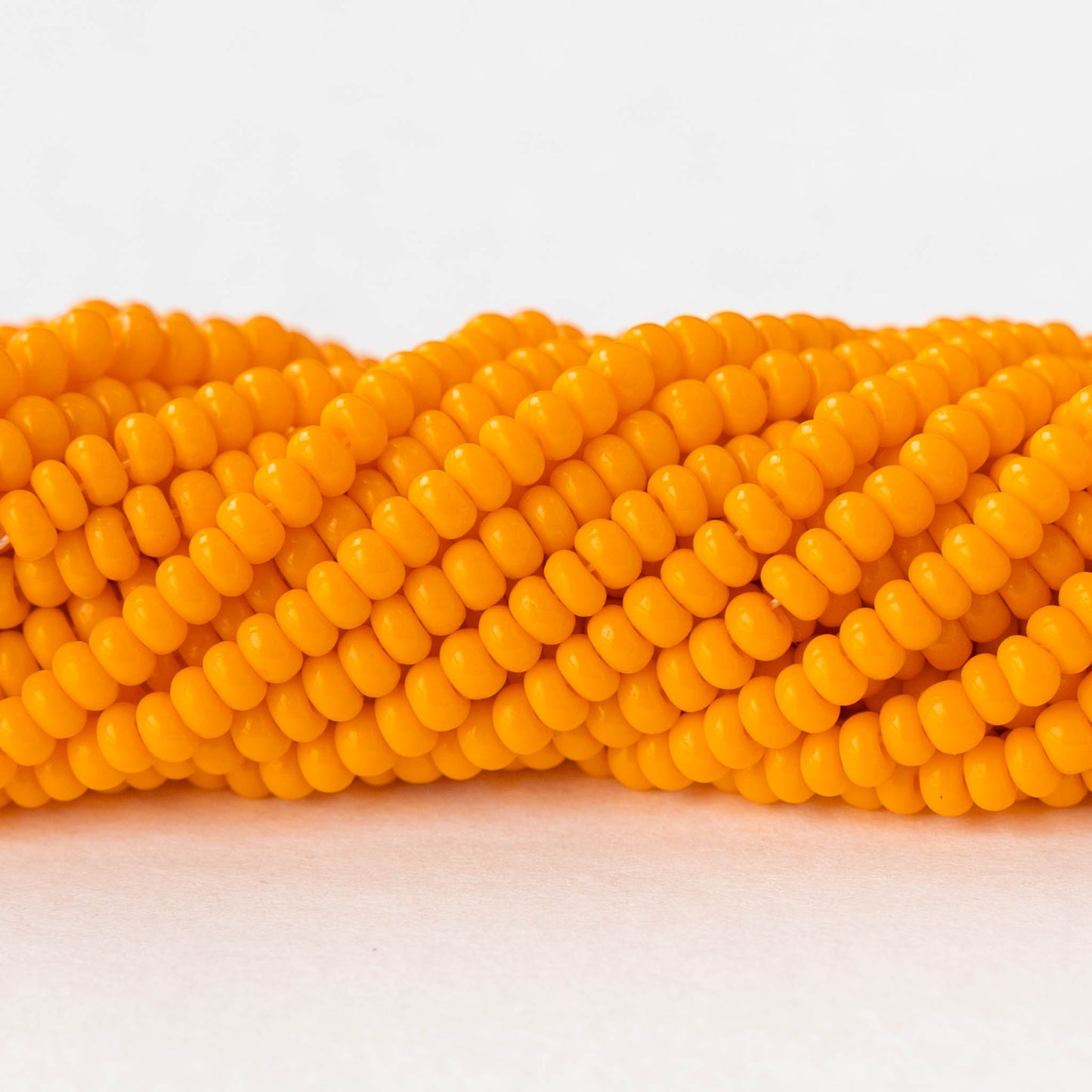9/0 Glass Seed Beads - Opaque Light Orange - 18 inch strands - Whole or Half Hank