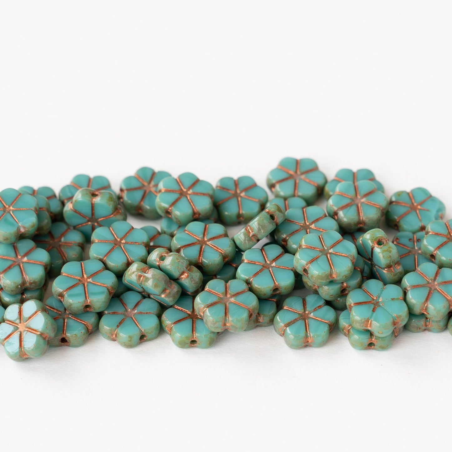 10mm Forget Me Not Flower Beads - Turquoise With Copper Wash - 10 Beads
