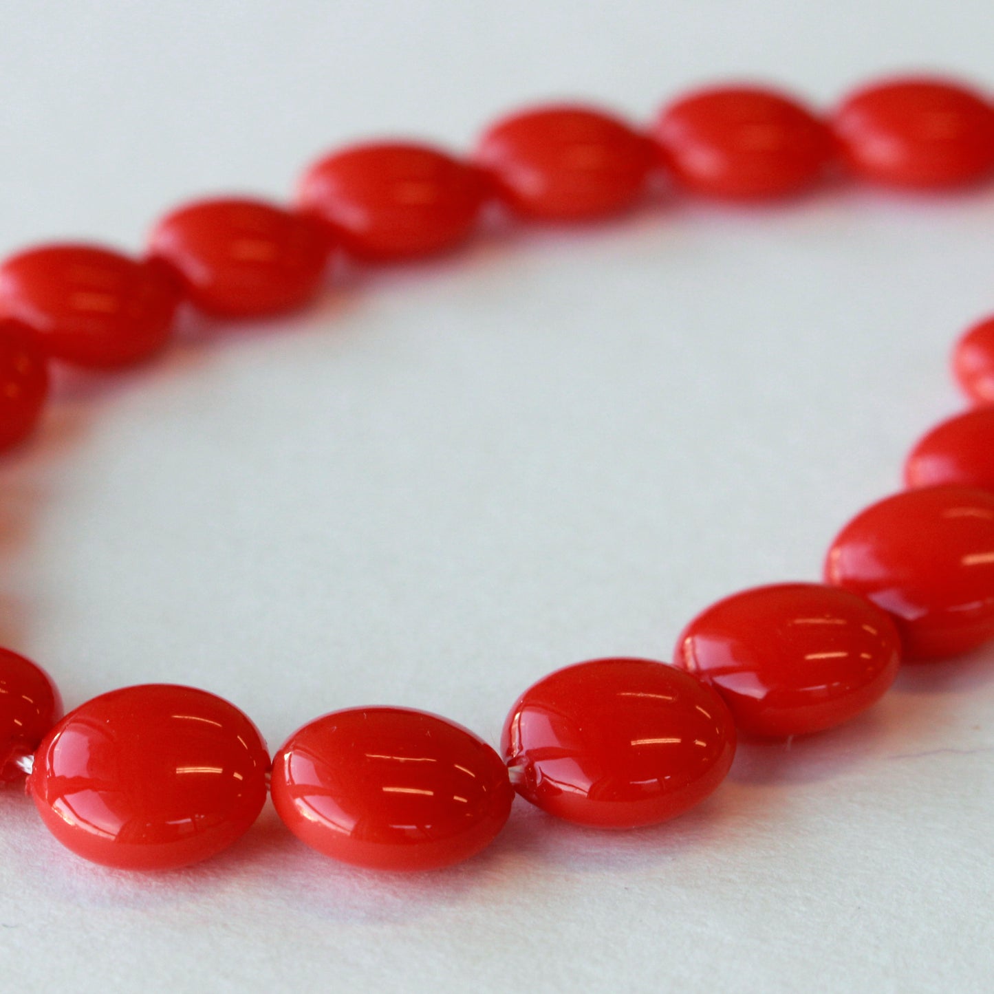 Load image into Gallery viewer, 10mm Mother of Pearl Coin Beads - Coral - 16 Inch Strand
