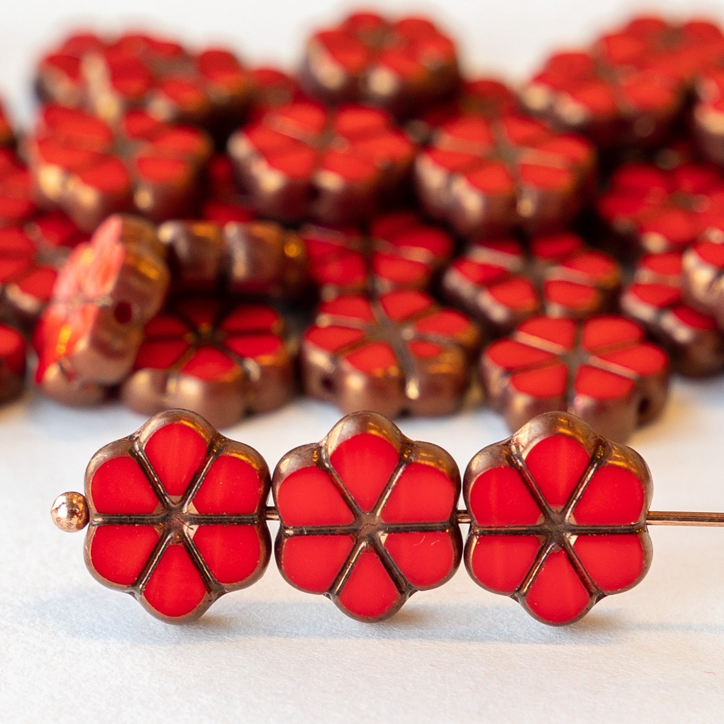 Load image into Gallery viewer, 10mm Forget Me Not Flower Beads - Opaque Red with Bronze Wash - 10 Beads
