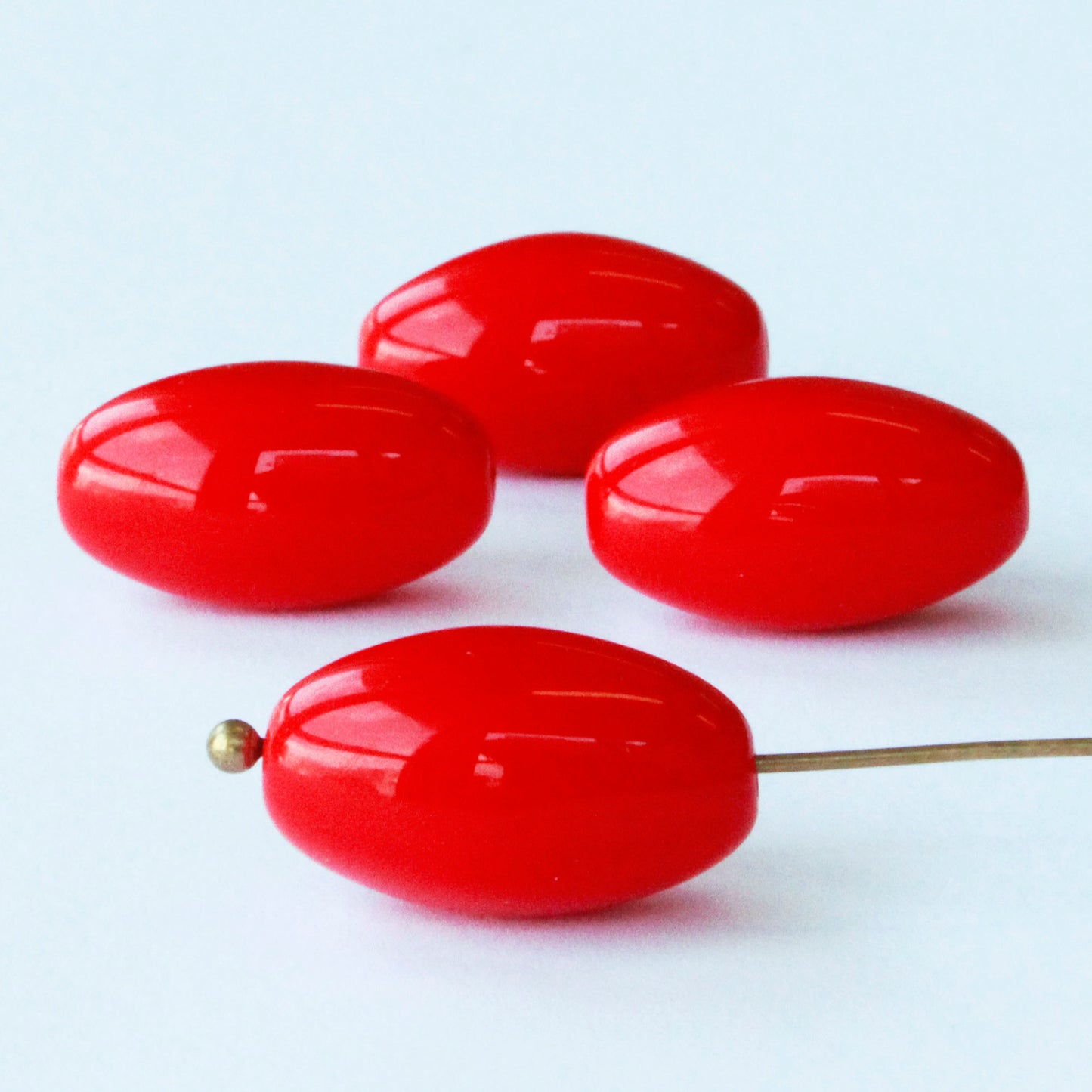 Load image into Gallery viewer, 10x17mm Opaque Glass Oval Beads - Red - 10 or 30
