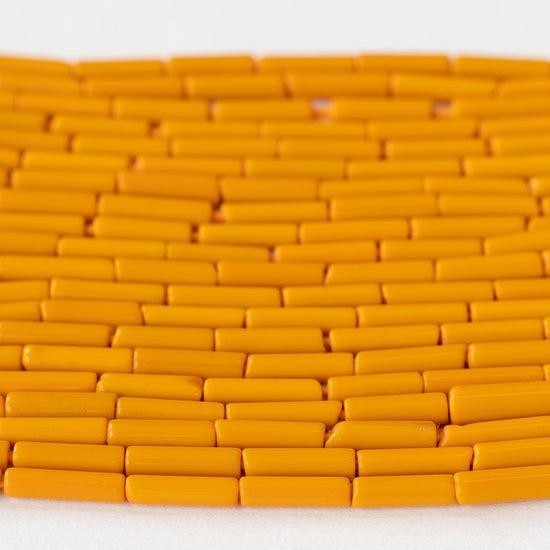 Load image into Gallery viewer, 11mm Tube Beads - Orange Shell - 16 Inch Strand
