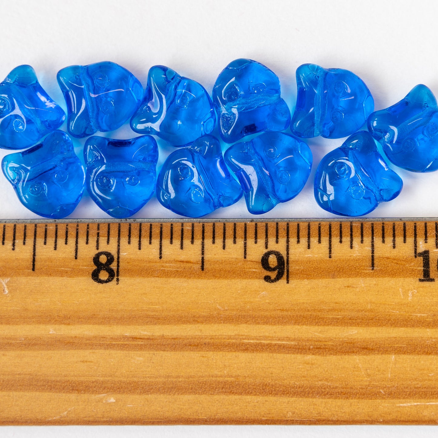 11mm Glass Cat Beads - Transparent Blue - 11 Beads