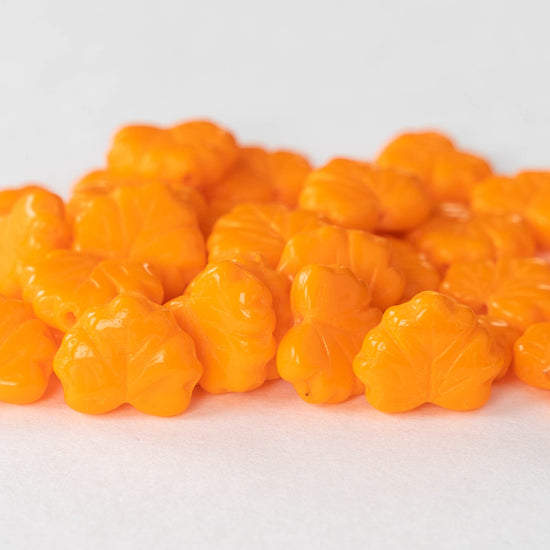 Load image into Gallery viewer, Czech Glass Leaf Beads - Opaque Orange - 20 beads
