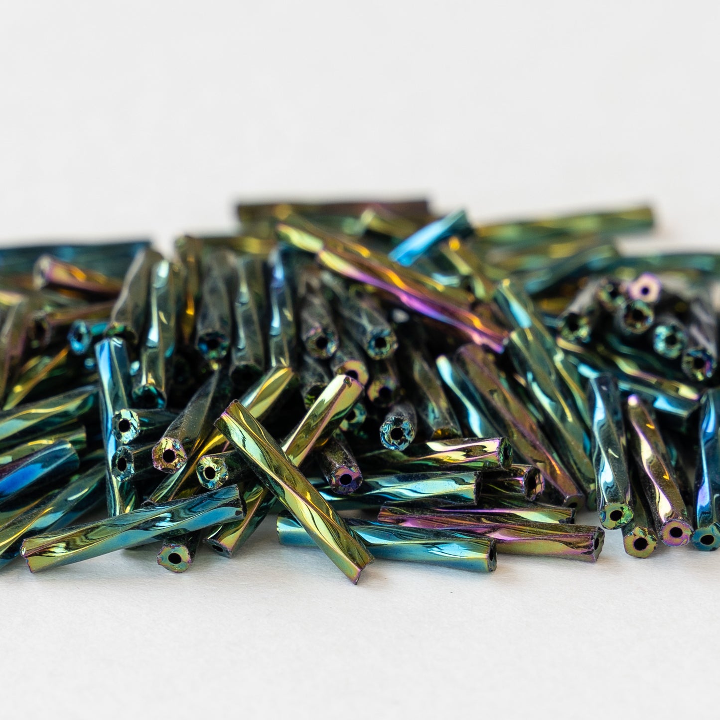 15mm Twisted Bugle Beads - Transparent Emerald Green Iris - 200 Beads –  funkyprettybeads