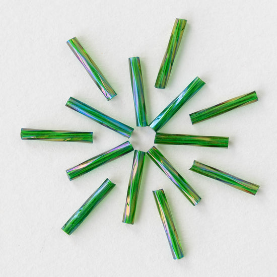 Load image into Gallery viewer, 15mm Twisted Bugle Beads - Transparent Emerald Green Iris - 200 Beads
