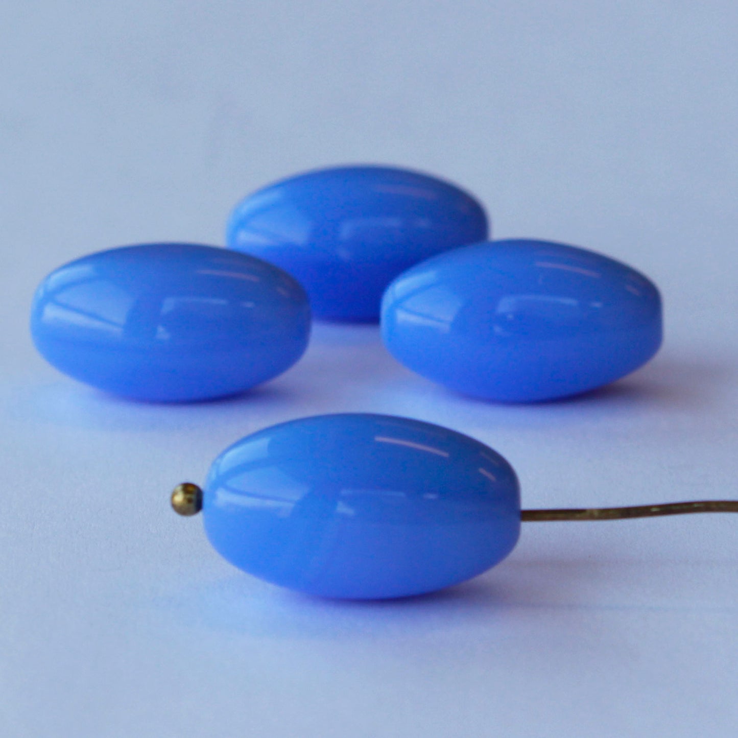 Load image into Gallery viewer, 10x17mm Opaque Glass Oval Beads - Periwinkle - 10 or 30
