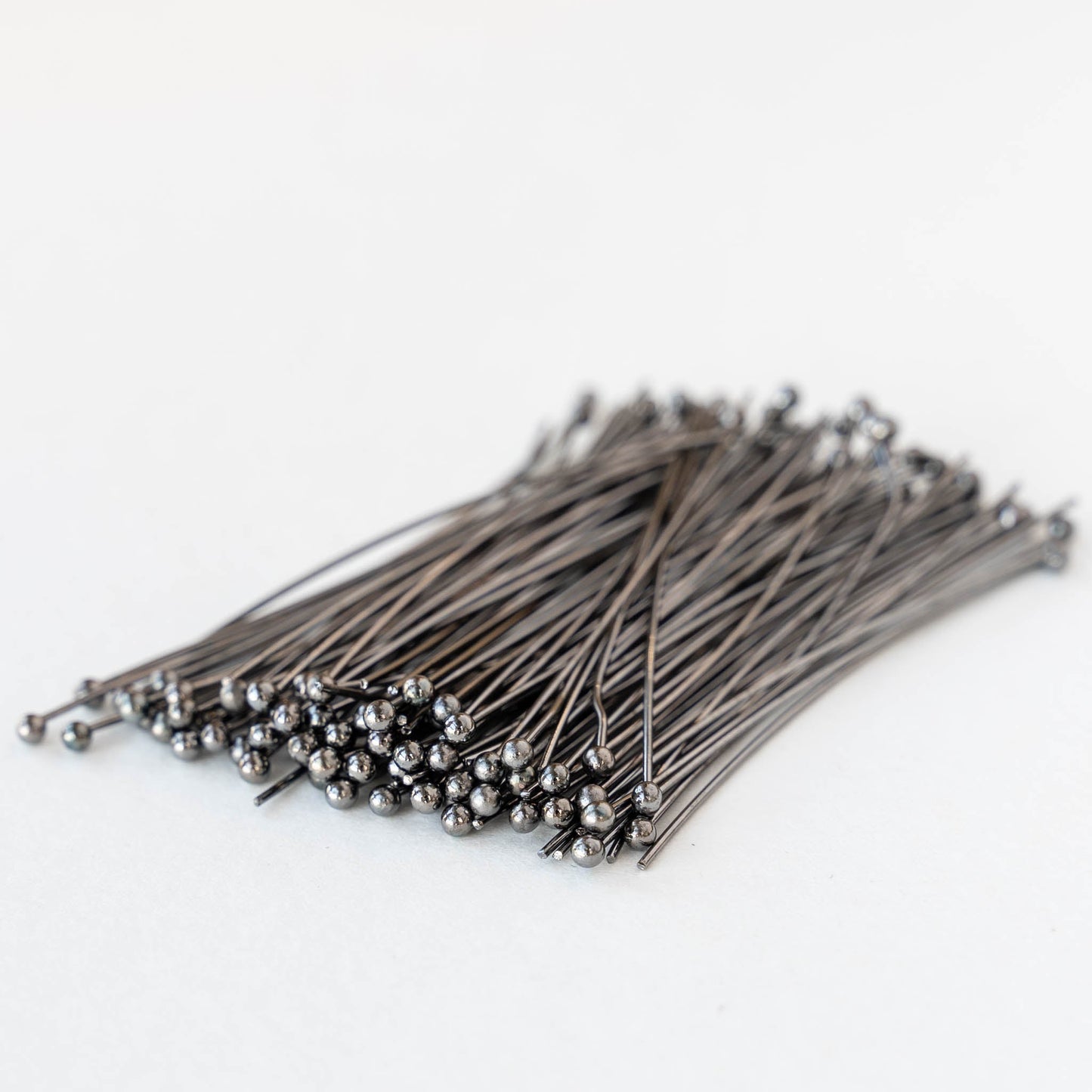Load image into Gallery viewer, 22g Gunmetal Balled Headpins - 50
