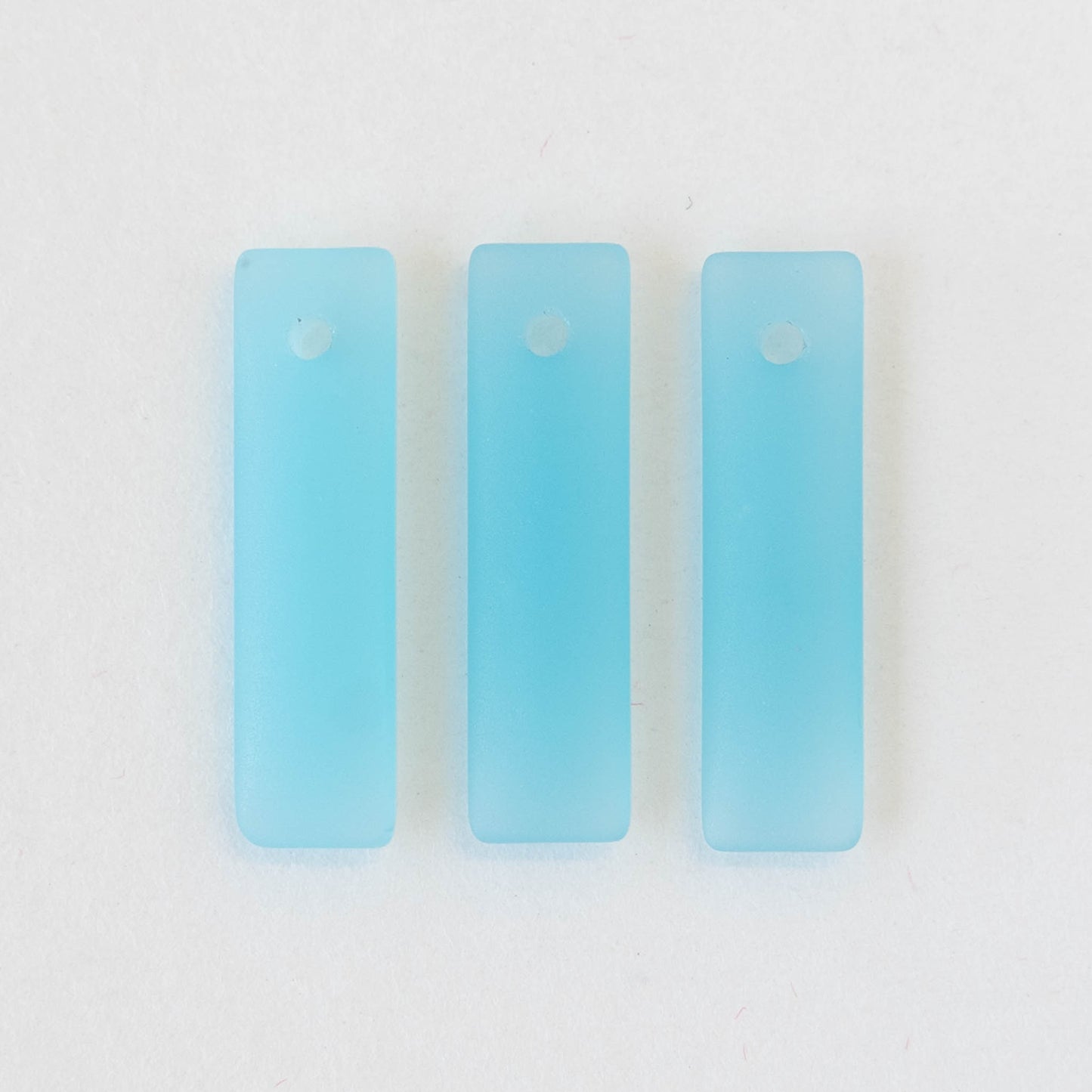 Load image into Gallery viewer, 22mm Frosted Glass Rectangle Pendants - Opaque Light Aqua - 6 beads
