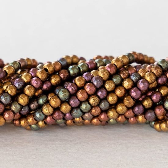 Load image into Gallery viewer, 2mm Round Glass Beads - Metallic Bronze Iris - 100 Beads
