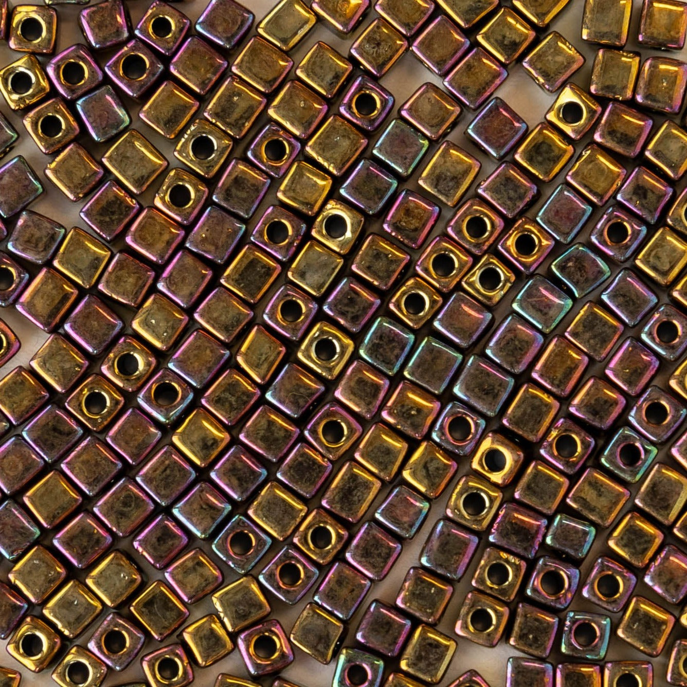 Load image into Gallery viewer, 3mm Miyuki Cube Beads - Metallic Gold Iris  Beads
