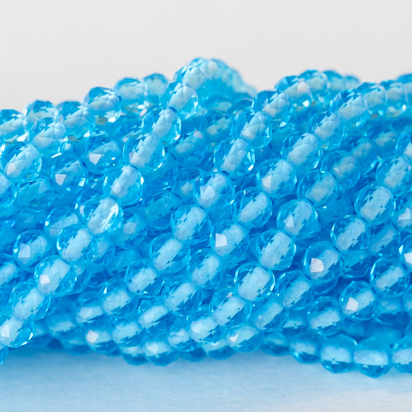 4mm Faceted Round Crystal Beads - Aqua - 15 Inches