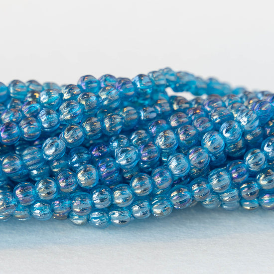 3mm Melon Beads - Capri Blue AB - 100 Beads