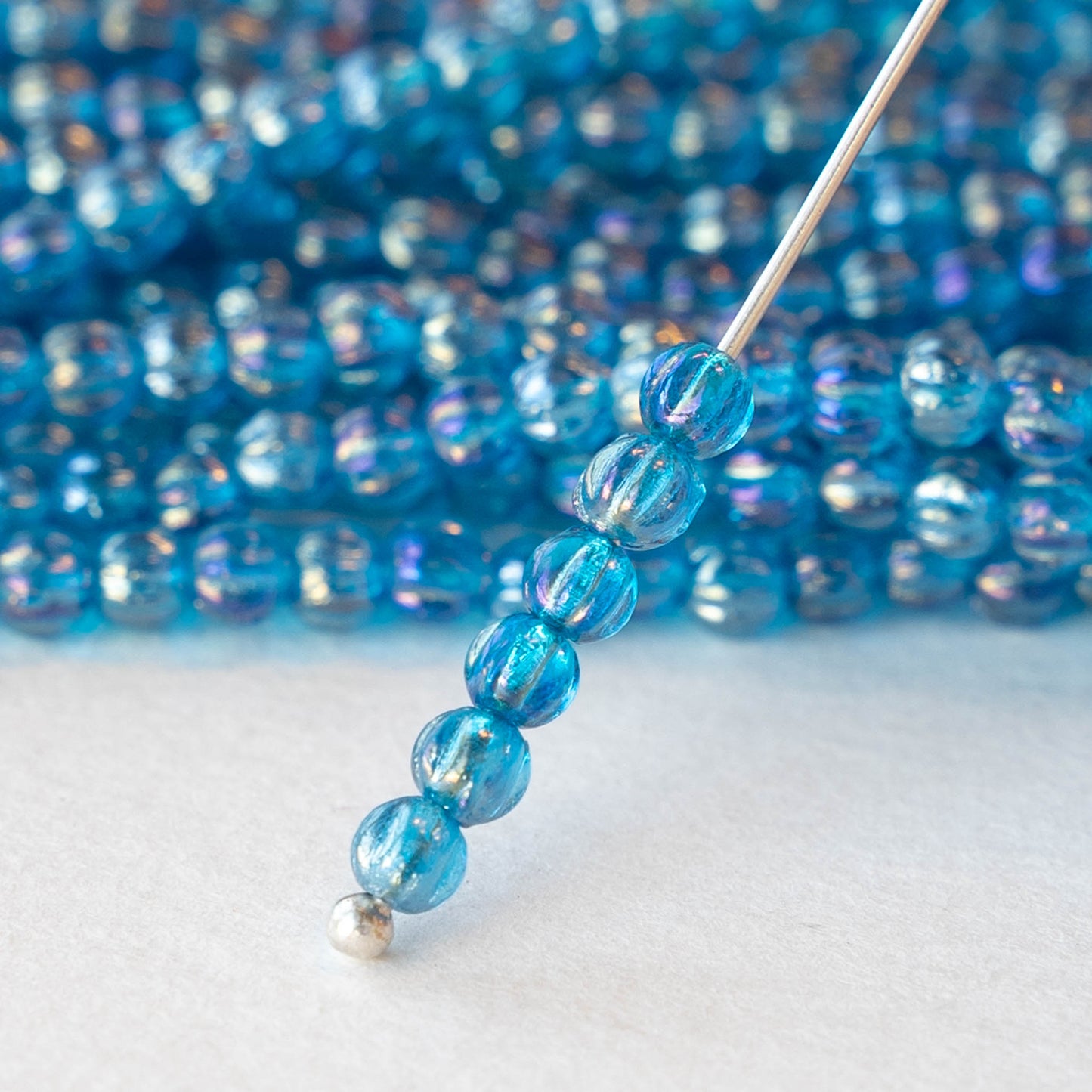 3mm Melon Beads - Capri Blue AB - 100 Beads